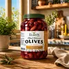 Elaion Kalamata Oliven 1,6 kg Glas auf einem Holztisch Produktbild-Vorschau