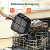 A hand is holding an air fryer basket over a dishwasher rack filled with dishes. Produktbild-Vorschau