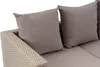 A close-up view of a section of a sofa with two cushions. Produktbild-Vorschau