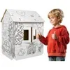 A young boy gives a thumbs up next to a large, uncolored cardboard playhouse with drawings on it. Anteprima dell’immagine prodotto