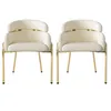 Two beige upholstered chairs with gold metal legs are shown against a white background. Podgląd zdjęcia produktu