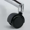 A close-up view of a black caster wheel attached to a chrome-plated metal leg. Anteprima dell’immagine prodotto