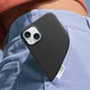 A black iPhone 15 case is tucked into the back pocket of light blue jeans. Produktbild-Vorschau