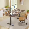 A home office setup with a standing desk, monitors, and chair. Náhled obrázku produktu