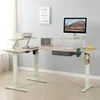 An L-shaped adjustable standing desk setup in a home office environment. Anteprima dell’immagine prodotto