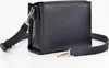A black handbag with a strap is shown against a white background. Náhľad obrázku produktu