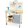 A wooden children's workbench with various tools and accessories. Produktbild-Vorschau