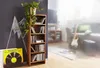 A living room scene with a CD shelf, a guitar, and a sofa. Anteprima dell’immagine prodotto