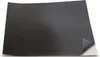 A black magnetic sheet with a corner peeled back. Produktbild-Vorschau