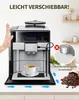 A coffee machine is shown on a black mat on a kitchen counter, with a hand pushing it to demonstrate ease of movement. Coffee beans are spilled next to it, and a cup of coffee is being dispensed. Produktbild-Vorschau