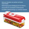 A red and white food chopper filled with diced colorful vegetables. Produktbild-Vorschau