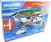 A Playmobil police seaplane toy set on its packaging, with a depiction of the toy in action on water. Produktbild-Vorschau