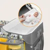A close-up view of a baby changing station attached to a playpen, with a baby lying on the changing pad. Podgląd zdjęcia produktu