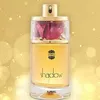 A bottle of Ajmal Shadow perfume with a golden, bokeh background. Náhľad obrázku produktu