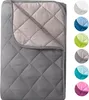 A quilted blanket folded and displayed on a white background, with a row of color swatches to the right. Produktbild-Vorschau