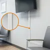 A close-up view of a white cable channel attached to a wall, with a section highlighted by a magnifying circle. Náhled obrázku produktu
