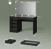A 3D rendering of a black vanity table with gold accents and LED lights, along with separate diagrams of its drawers. Produktbild-Vorschau