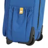 Close-up of the bottom corner of a blue rolling suitcase, showing the wheels and a small pocket with a yellow tag. Produktbild-Vorschau