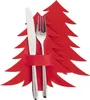 A red felt Christmas tree-shaped cutlery holder with a knife and fork inserted. Voir les images du produit