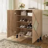 A wooden shoe cabinet with doors open, displaying shoes and decorative items on shelves, placed in a room with a rug and curtains. Anteprima dell’immagine prodotto