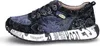 A side view of a single sneaker. Produktbild-Vorschau