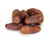 A pile of dates on a white background. Voir les images du produit