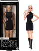 A Barbie doll in a black dress and boots, shown both in its packaging and displayed separately. Náhled obrázku produktu