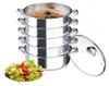 A stack of stainless steel steaming pots with a glass lid and a salad in a bowl. Podgląd zdjęcia produktu