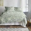 A neatly made bed with floral patterned bedding in a bedroom setting. Produktbild-Vorschau