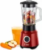 A red Russell Hobbs blender filled with fruit and ice, next to a glass of orange juice and some fruit slices. Produktbild-Vorschau