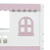 A close-up view of a white wooden house-shaped bed frame with pink decorative elements, including a scalloped roof trim and a window frame. Anteprima dell’immagine prodotto