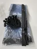 A transparent PVC protective wall with black ties and grommets, folded and lying on a light gray surface. Produktbild-Vorschau