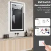 A bathroom vanity with a lit mirror, faucet, and accessories, alongside instructional graphics and a wall switch. Produktbild-Vorschau