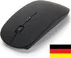 A black wireless computer mouse is shown on a white background. A small German flag is in the bottom right corner. Produktbild-Vorschau