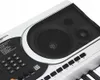 A close-up view of a digital keyboard's speaker and control panel. Produktbild-Vorschau