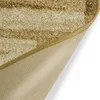 Close-up view of the underside and edge of a beige carpet runner with a striped pattern. Produktbild-Vorschau