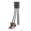 A shoe dryer with four flexible hoses is shown, with two beige boots attached to two of the hoses. Voir les images du produit