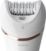 Close-up of a white and rose gold epilator with a light symbol and 'Wet & Dry' text. Náhľad obrázku produktu