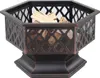 A hexagonal fire pit with a decorative lattice pattern and a base, filled with firewood, isolated on a white background. Anteprima dell’immagine prodotto