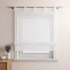 A white sheer Roman blind with embroidered wavy lines and beads is installed on a window. Produktbild-Vorschau