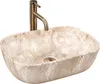 A stone-like basin with a faucet. Anteprima dell’immagine prodotto