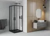 A modern bathroom with a black framed shower cabin and a floating vanity with a sink. Podgląd zdjęcia produktu