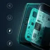 A close-up view of a transparent wall charger showing its internal circuitry, with icons representing features on the left. Anteprima dell’immagine prodotto