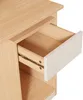 A close-up view of an open drawer on a wooden desk or cabinet. Produktbild-Vorschau