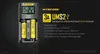 A Nitecore UMS2 USB charger with two batteries inserted, displayed against a dark background with product features listed in German. Podgląd zdjęcia produktu