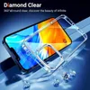 A clear phone case is shown on top of a phone, with diamonds scattered around the base. Náhľad obrázku produktu