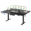 A black standing desk with three monitors, a laptop, and accessories. Voir les images du produit