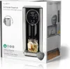 A product shot of a Nedis hot water dispenser on its packaging, with an inset image of a kitchen counter. Voir les images du produit