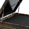 A close-up view of the interior of a rattan storage box, showing the lid mechanism and the black lining of the box. Náhled obrázku produktu