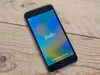 An iPhone 8 Plus is placed on a wooden surface. Produktbild-Vorschau